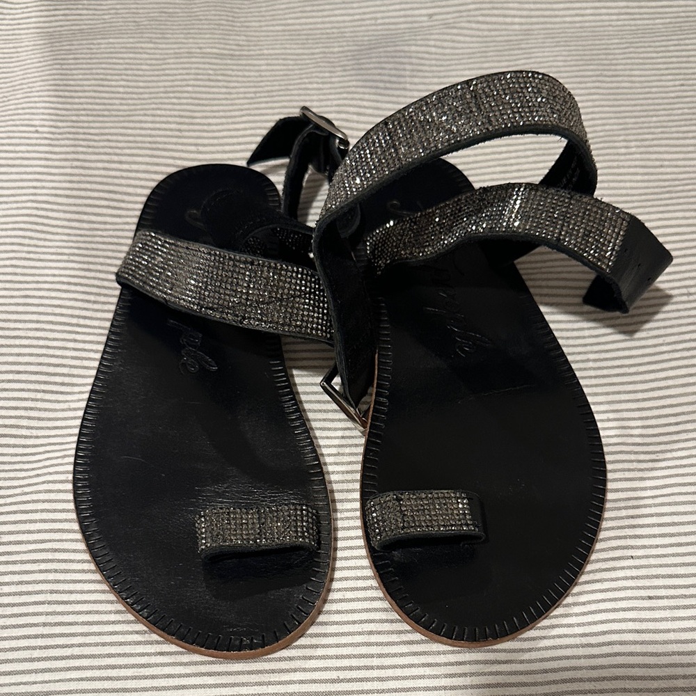 Elegant Free People Black Sandals with Silver Accents